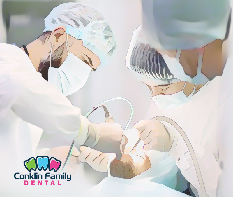 Professional dental team administering IV sedation in a modern, comfortable setting at Conklin Family Dental IV sedation procedure at Conklin Family Dental Brantford